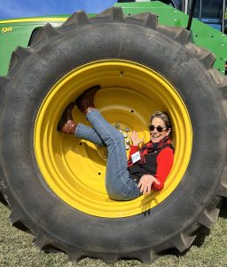 Image of TPA Board and Executive Committee Vice Chair Maria Marino in a tractor tire